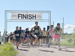Runners head out onto the Algonquin Trail in the 5km and 10km trail races held last month as part of Petawawa's 25th anniversary celebrations. Submitted photo