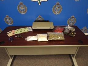 Drugs and currency seized by Sarnia police Thursday. (Handout)
