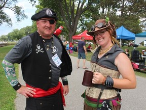 Pirates “Captain” Chris Blair and Trish Beaton, who goes by the pirate name of “Coyote,” were helping out Saturday at the Mermaids and Mariners festival in Port Lambton.