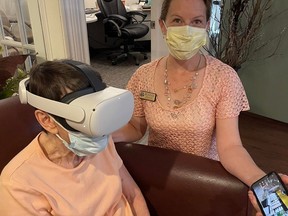 Shirley Cole, left, a resident at Delrose Retirement Residence, and administrator Bonnie Guthrie  participate in a virtual reality (VR) activity. The new oculus headsets are available for residents within the Delhi facility. Residents will have different VR programming options for which to indulge.