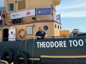 Captain Noah Krantz aboard the Theodore Too which arrived in Port Dover late Tuesday. The famous tugboat will welcome visitors August 3 to 6 from 10 a.m. to 4 p.m. each day. ALEX HUNT
