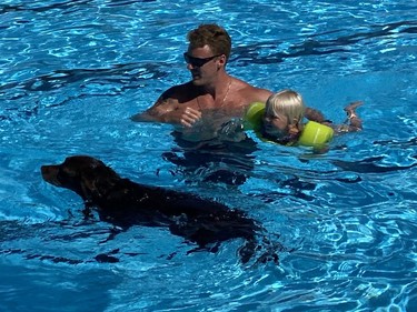 Simcoe area resident Jon Goetz, his daughter Stella and dogs Adrian and Mocha attended the Splish Splash Doggie Bash at the Delhi Kinsmen pool on Sunday afternoon.  SIMCOE REFORMER PHOTO