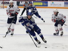 Kocha Delic, middle, of the Sudbury Wolves, breaks to the net during OHL action against the Oshawa Generals at the Sudbury Community Arena in Sudbury, Ont. on Friday January 21, 2022. John Lappa/Sudbury Star/Postmedia Network