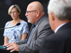 Greater Sudbury Mayor Brian Bigger participates in a federal funding announcement in front of the YMCA on Tuesday.