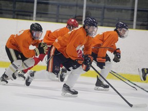 Soo Thunderbirds forward Michael Chaffay leads a group of teammates during skating drills at the John Rhodes Community Arena on Wednesday morning.