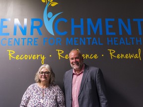 Enrichment Centre for Mental Health Executive Director Sandie Sidsworth and Bay of Quinte MPP Todd Smith stand together after Smith announced a $546,364 investment and $155,200 grant for the centre on Friday. ALEX FILIPE