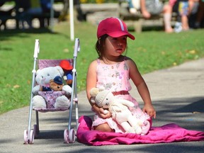 Octavia Starkey, 3, of the Port Elgin area watches a Friends and Neighbours Club puppet show during the Canadian Mental Health Association's sixth annual Teddy Bear Picnic at Harrison Park in Owen Sound on Friday, September 2, 2022.