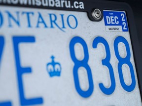 The Ontario government scrapped licence plate renewal fees and corresponding stickers for passenger vehicles, light duty trucks, motorcycles and mopeds, earlier this year. THE CANADIAN PRESS/Nathan Denette