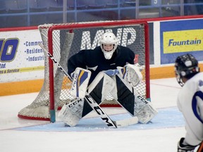 Nate Krawchuk of Team Blue prepares to make a save during the Sudbury Wolves' annual Blue and White Game at Sudbury Community Arena in Sudbury, Ontario on Friday, September 2, 2022.