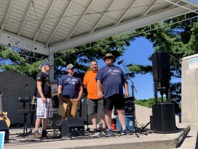 Adam Wells, a fuel safety inspector with Technical Standards and Safety Authority, speaks to the crowd at Monday's Labour Day Picnic held at the North Bay Waterfront. Wells is one of 170 TSSA workers who have been on strike since July 12.