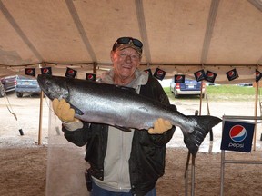 John Earnest of Owen Sound with his winning 25.495-pound Chinook salmon at the award ceremony for the 34th Owen Sound Salmon Spectacular on Sunday, September 4, 2022.