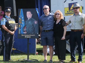 An official park dedication ceremony was held Saturday at Sgt. Andrew Harnett Memorial Park in Hagersville. Among those attending during the Summer’s End Festival were from left Auxiliary OPP member Chris Dennis, with Harnett's brothers and mother, Jason, Valerie and Chris Harnett. CHRIS ABBOTT