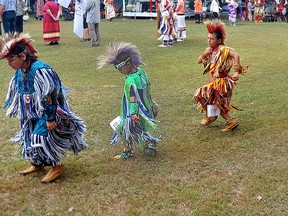 These youngsters display their dancing talent during the Grand Entry to the Delaware Nation on the Thames 50th annual Powwow, on Sunday. Ellwood Shreve/Postmedia