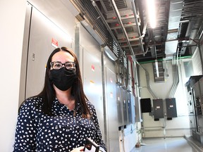 erra Kitzul Arens, the Chatham-Kent Health Alliance’s project manager of facilities planning, is shown outside the electrical room at the Wallaceburg hospital's new power plant on Sept. 1. Tom Morrison/Chatham This Week