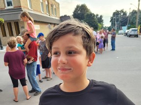 Arius Sears enjoys an ice cream cone during the Toonie Tuesday event in Rodney on Aug. 30. The event was very well attended. Larry Schneider photo