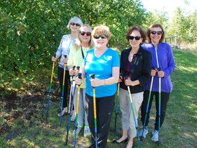 Elizabeth Racic, far left, Margaret Sell, Myfawny (Muffy) McIntosh, group leader, with Maria Marrone, and Antonietta Dell believe in the power of urban poling.