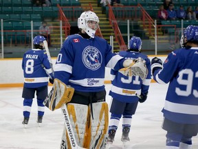 Greater Sudbury Cubs goalie Nathaniel Boyes (30) congratulates his teammates following Cameron Walker's goal against the Powassan Voodoos during the Cubs' NOJHL season opener at Gerry McCrory Countryside Sports Complex in Sudbury, Ontario on Thursday, September 8, 2022.