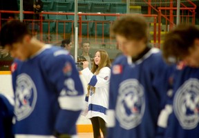 Greater Sudbury Cubs players listen to the national anthem before the Cubs' NOJHL season opener against the Powassan Voodoos at the Gerry McCrory Countryside Sports Complex in Sudbury, Ont., on Thursday, September 8, 2022.