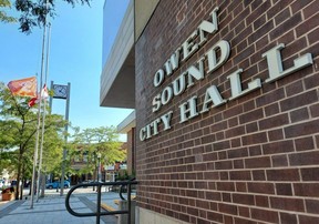 The Canadian flag and the Every Child Matters flag in recognition of the National Day for Truth and Reconciliation on September 30, fly at half mast in front of Owen Sound City Hall on Friday, September 9, 2022, one day after the death of Queen Elizabeth II at the age of 96.