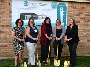 Stratford's Optimism Place women's shelter hosted an official ground-breaking ceremony for its planned 7,000 square-foot, 18-bed expansion Thursday night, which is expected to open in the fall of 2023. Pictured from left are Building on Hope Campaign committee chair Kathy Vassilakos, Optimism Place board chair Christy Jacobs, Stratford director of social services Kim McElroy, Optimism Place executive director Jasmine Clark and Marklevitz Architects Inc. general manager Michelle Lester. Galen Simmons/The Beacon Herald/Postmedia Network