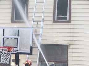 Firefighters respond to a house fire at 714 Shafer Ave., on Saturday, Sept. 11, 2022 in Sault Ste. Marie, Ont. (BRIAN KELLY/THE SAULT STAR/POSTMEDIA NETWORK)