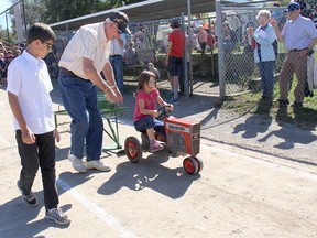 The toy tractor pull was a popular event at the 159th Highgate Fair in 2013. Oragnizers are looking for participants for this year's fair parade on Sept. 24. (File photo/Postmedia Network)