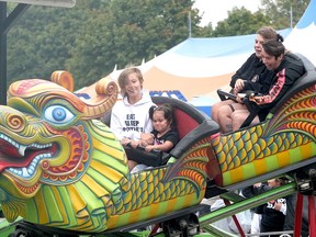 An estimated 50,000 people attended the annual Paris Fair this year. CHRIS ABBOTT