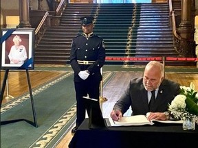 Todd Smith, Bay of Quinte MPP and Ontario Energy Minister, signed a book of condolences at Queen’s Park on behalf of his constituents as Lieut. Gov. Elizabeth Dowdeswell and Premier Doug Ford held a ceremony Monday to proclaim the accession of King Charles III.