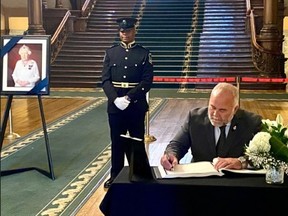 Todd Smith, Bay of Quinte MPP and Ontario Energy Minister, signed a book of condolences at Queen’s Park on behalf of his constituents as Lieut. Gov. Elizabeth Dowdeswell and Premier Doug Ford held a ceremony Monday to proclaim the accession of King Charles III.