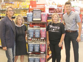 Chateaubriand Organic Farm owners Randy and Mary Briand, Hyska's Your Independent Grocer owner Valerie Hyskas, and Mitch Briand, Chateaubriand marketing manager. The local farm's new organic, gluten-free pancake and waffle mix and flour is now on sale at Hyska's in Petawawa. Anthony Dixon