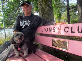 Dennis Dinelle and Majia enjoy the view of the St. Mary’s River from the bench dedicated in 2017 to Tracy’s Dinelle’s memory by the Lions Club of Sault Ste. Marie. The bench is situated on the waterfront near the Mill Market Farmers Market. JEFFREY OUGLER