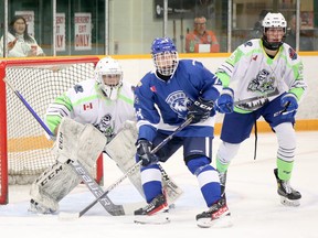 Espanola Paper Kings goaltender Drew Gaulton (1)  and defenceman Conor Walton (6) keep close tabs on Greater Sudbury Cubs forward Nolan Newton (24) during NOJHL action at Gerry McCrory Countryside Sports Complex in Sudbury, Ontario on Thursday, September 15, 2022.