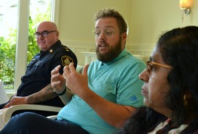 MacGregor Austin-Olsen, a registered social worker and the mental health, wellness and resiliency coordinator with the Stratford Police Service, speaks about the frustrating lack of access to mental-health services and supports that affects not just newcomers but many residents of Stratford and the surrounding area.  (Galen Simmons/The Beacon Herald)