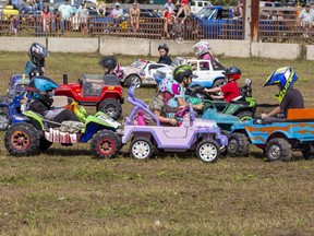 Children take part in a Power Wheels demolition derby on Saturday at the 163rd annual Donnybrook Fair in Walsh, Ontario.