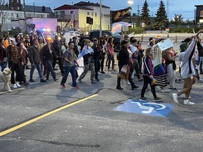 More than one hundred took the streets of North Bay for the first ever Trans march.