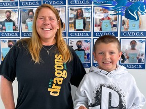 Chelmsford Valley District Composite School student Lucas Coulombe celebrates his latest of 19 Reading Stars with teacher Cindy Blanchard.