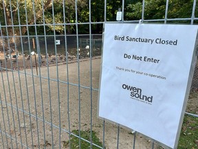 The bird sanctuary in Harrison Park is fenced off and under quarantine on Tuesday, September 20, 2022 after tests confirmed the highly pathogenic avian influenza (H5N1) in domestic birds in the park.