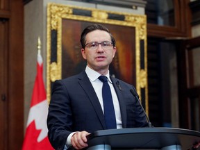 Canada's Conservative Party leader Pierre Poilievre speaks to news media outside the House of Commons on Parliament Hill in Ottawa on Sept. 13. REUTERS/Patrick Doyle
