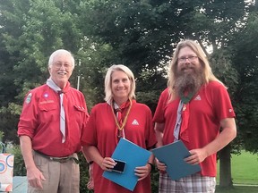 Ailsa Craig Scout Group commissioner Brian Luscombe (left) presented Scouting awards to the husband-and-wife team of Brooke and Mike Bax in early September.
Handout/Strathroy Age Dispatch