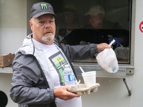 Don Blackstone and volunteers from the Haldimand-Norfolk branch of Men's Street Ministry deliver free lunches to people in need every Tuesday in Simcoe and Jarvis.  Chris Abbott