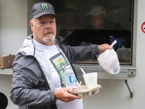 Don Blackstone and volunteers from the Haldimand-Norfolk branch of Men's Street Ministry deliver free lunches to people in need every Tuesday in Simcoe and Jarvis. Chris Abbott