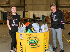 The Fort Falcons Football team recently donated 370lbs of food and raised $195 for the Fort Saskatchewan Food Bank. The local organization is hosting a city-wide food drive this Saturday, Sept. 24. Photo Supplied via Facebook