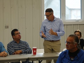 Kenora-Rainy River MPP Greg Rickford made a special visit to the Kenora Chiefs Advisory Youth and Wellness Camp on the morning of Sep. 9 to make the big announcement. He is seen here speaking on location next to Grassy Narrows Chief Randy Fobister and KCA Executive Director Joe Barnes.

Photo by Bronson Carver