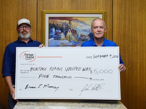Portage Mutual Staff Brian Mooney, Regional Manager of Branch Operations for MB & SK (right) presenting a cheque to Otis Mathews of United Way. (supplied photo)
