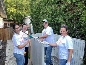 Robyn Thompson, Karissa Khan, Brian Lucas and Erin DaSilva of Ineos Styrolution volunteered for the 27th annual United Way of Sarnia-Lambton Day of Caring. The Ineos Styrolution work crew was building a storage shed and general maintenance at a group home operated by the Sarnia and District Association for Community Living, one of 18 job sites in Sarnia and throughout Lambton County to help launch the 2022 United Way campaign. United Way photo