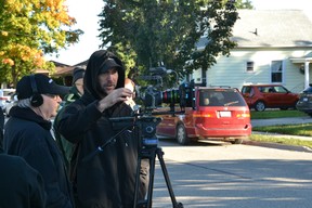 Director Allen Kool and director of photography Jason Lupish film a scene in front of a house on Salina Street North in St. Marys Friday morning. (Galen Simmons/The Beacon Herald)