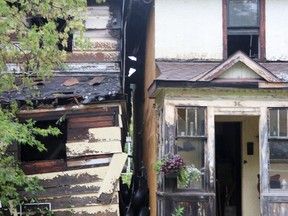 Two homes in the 0 to 100 block of Wemyss Street are taped off following a fire on Sunday, Sept. 25, 2022 in Sault Ste. Marie, Ont. (BRIAN KELLY/THE SAULT STAR/POSTMEDIA NETWORK)