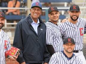 Fergie Jenkins poses with players before the New Generation game at the Field of Honour charity slo-pitch event celebrating the Chatham Coloured All-Stars at Fergie Jenkins Field at Rotary Park in Chatham on Sept. 24. Mark Malone/Postmedia