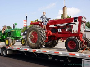 A float, taken in downtown Rodney during the parade, featured a 1968 John Deere 4020, owned by Dodie Bergey, shown with his children, Colton and Brie; and a 1973 International 766 tractor owned by Dan D'Hondt, with Hunter Gill, son of Danielle Debie, at the steering wheel.  Judd Kennedy photo