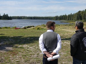 Kenora District Services Board CAO Henry Wall standing alongside Grand Council Treaty #3 Ogichidaa Francis Kavanaugh at Bug Lake, surveying where the roundhouse will be built. 

Photo by Bronson Carver